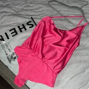 Hot pink bodysuit